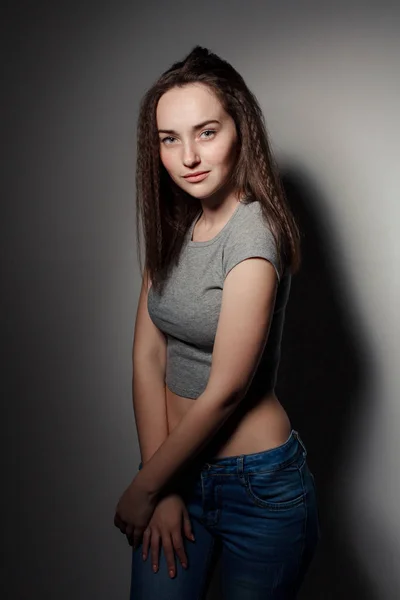 Portrait of young beautiful girl brunette in the Studio — Stock Photo, Image