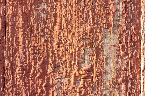 Texture of old wood with worn brown paint — Stock Photo, Image