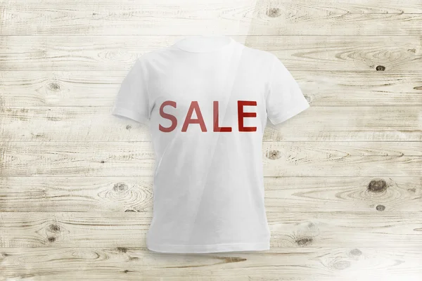 Bílé tričko s nápisem prodej dřeva pozadí — Stock fotografie