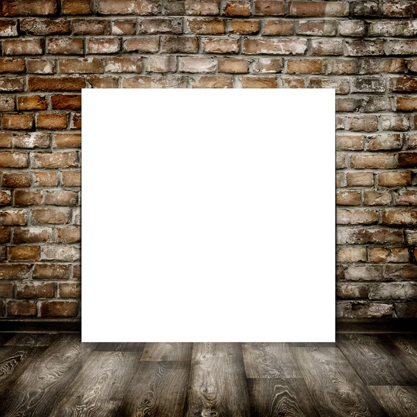 Empty poster in old interior with brick wall and wood floor — Stock Photo, Image