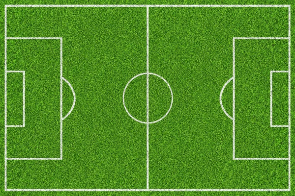 Green soccer field with white lines. Top view background