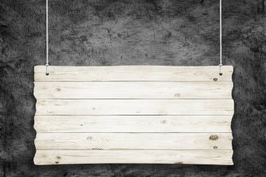 İpleri karanlık grunge arka plan üzerinde ahşap işaretiyle