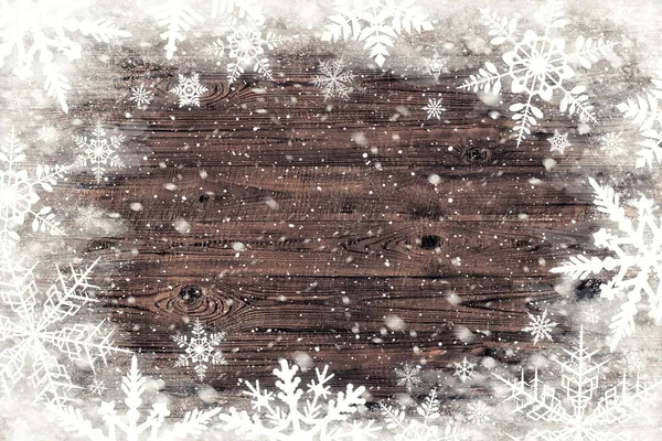 Το καφέ ξύλο υφή με νιφάδες χιονιού πάνω του. Χειμώνα φόντο — Φωτογραφία Αρχείου
