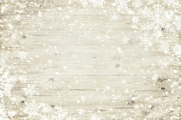 La textura de madera marrón con copos de nieve sobre ella. Fondo de invierno —  Fotos de Stock