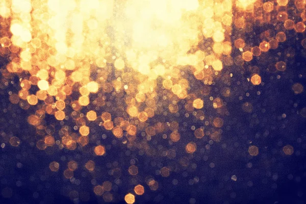 抽象的な黄金のほこりキラキラ背景 — ストック写真