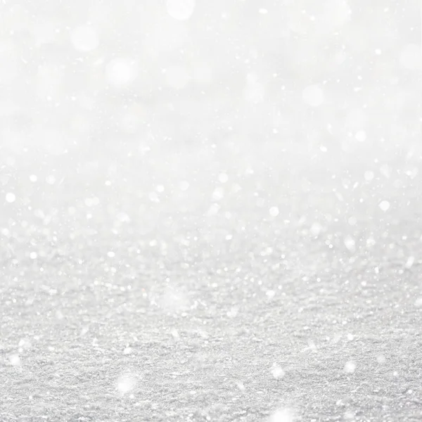 White snowflakes and blured bokeh christmas background — Stock Photo, Image