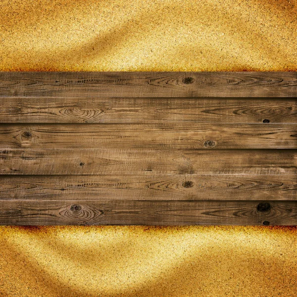 Deska Dřevěná prkna je nad pískem pozadí — Stock fotografie