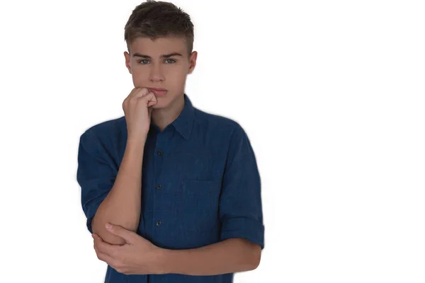 Adolescente chico en un azul camisa en un blanco background.an aislado objetivo — Foto de Stock