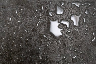 yağmur damlaları içinde gri granit granit dokulu ve su drops.back