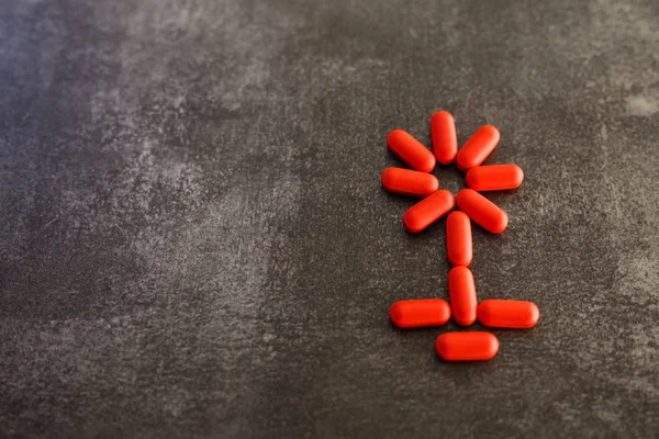 Pastillas medicinales medicamentos establecidos en forma de flor, símbolos o —  Fotos de Stock