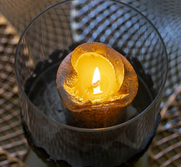 Burning candle on the table close-up — Stock Photo, Image