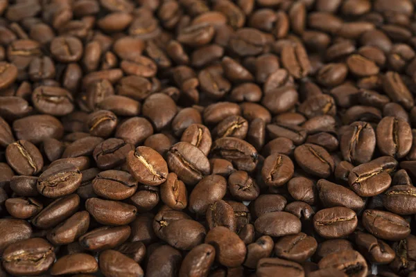Hintergrund aus Bohnen geröstete Kaffeebohnen — Stockfoto