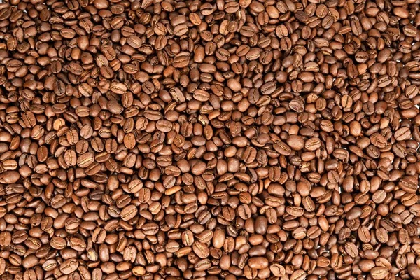 Hintergrund aus Bohnen geröstete Kaffeebohnen — Stockfoto