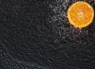 bir portakal ile su damlalarının arkaplanı