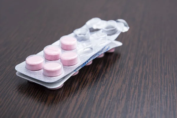 Pink Pills Packaging Table Close — Stock Photo, Image