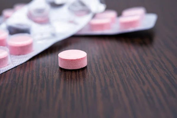 Pillole Rosa Confezione Sul Tavolo Primo Piano — Foto Stock