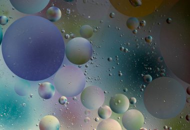 Aydınlık dairelerin soyut soluk arkaplanı