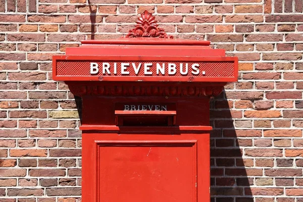 Red post box, Netherlands — Stock Photo, Image