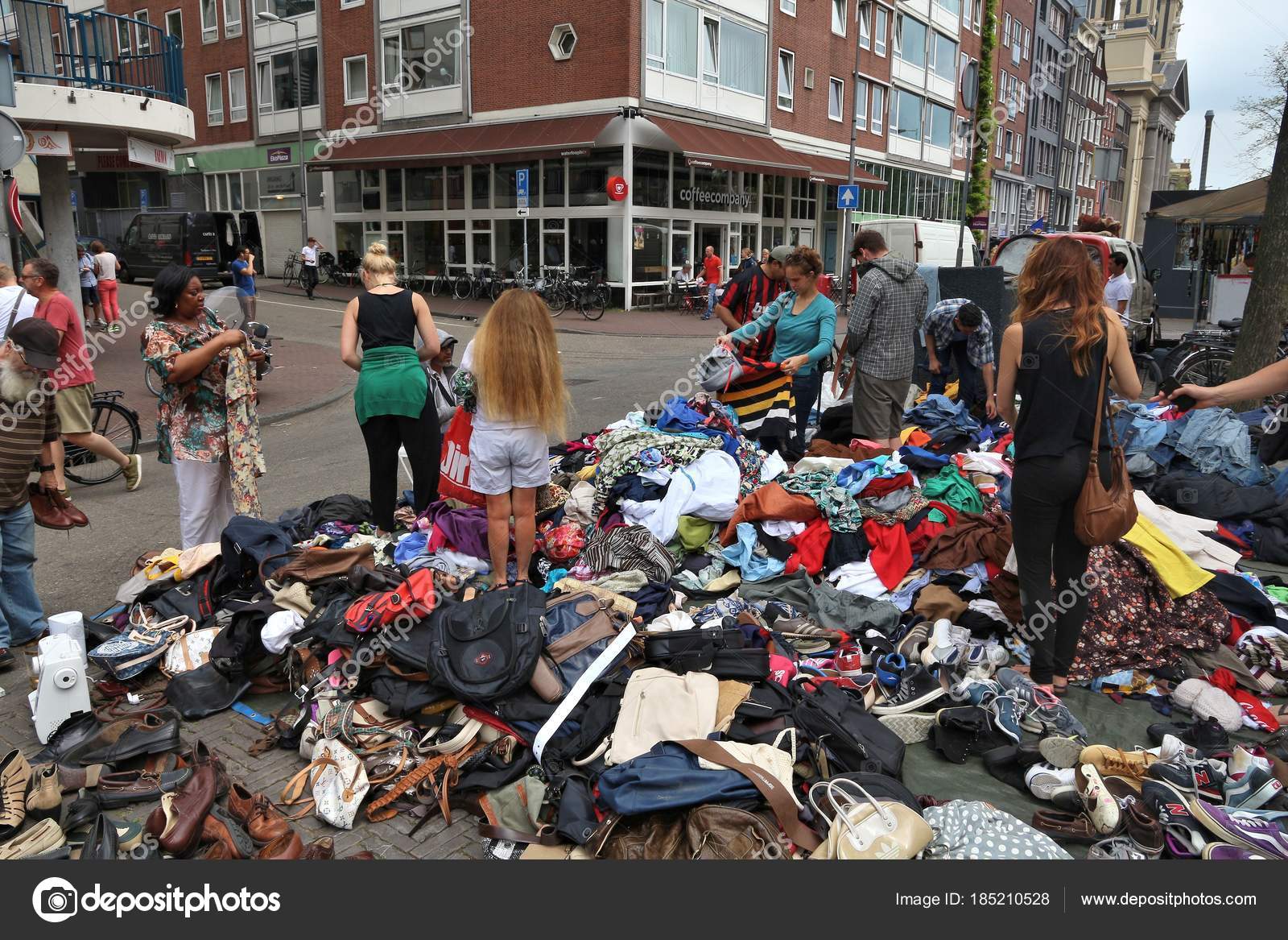 Flea market clothes Stock Editorial Photo © tupungato 185210528