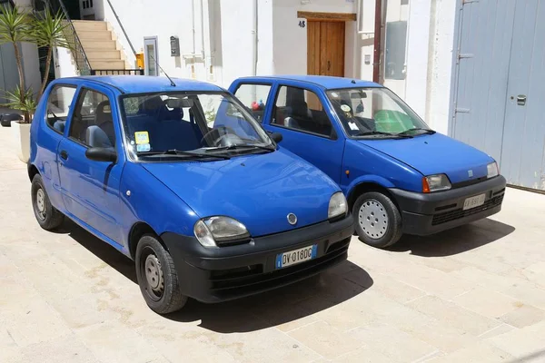 Small blue Fiats — Stock Photo, Image