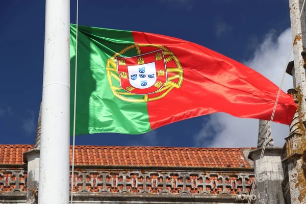 Flag of Portugal. National symbol of Portugal in the wind.