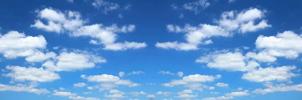 Sky background. White clouds on blue sky panoramic texture.