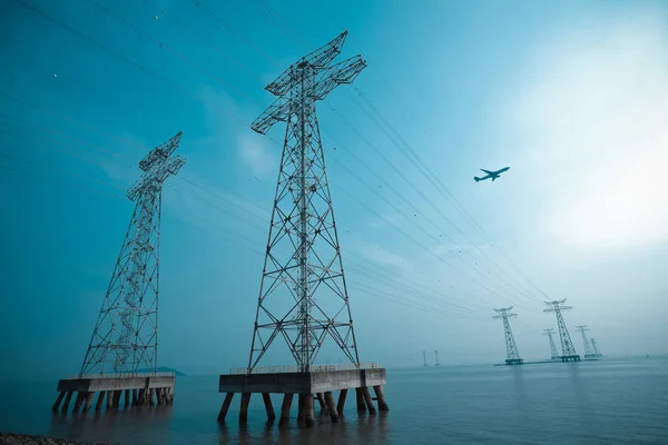 Look High Voltage Power Transmission Towers Sea Skyline 로열티 프리 스톡 이미지