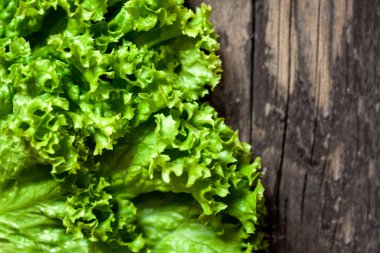 leaf salad on wooden tabl