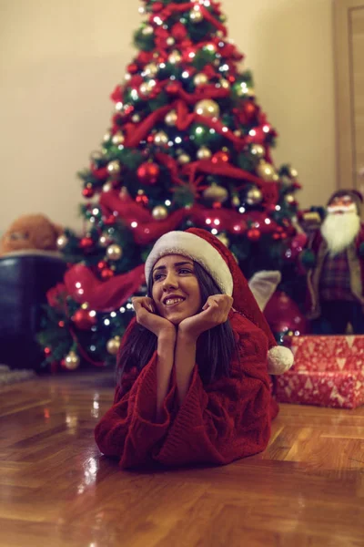 Smiling girl enjoying at Christmas time — Stock Photo, Image