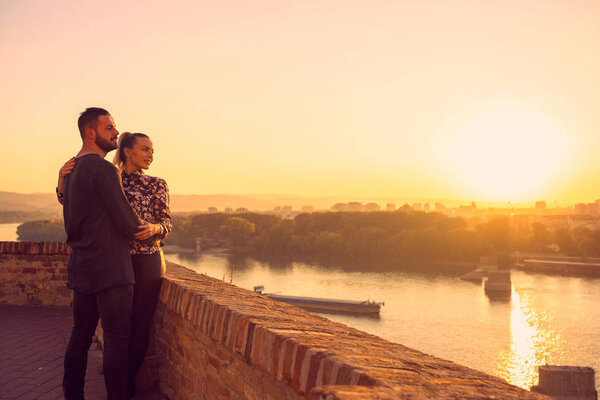 couple in love.couple enjoying together on romantic sunset.