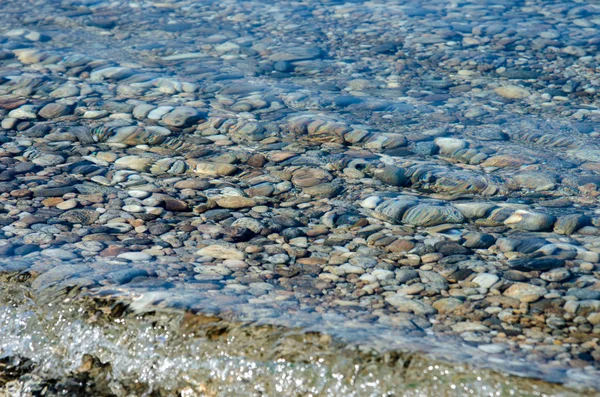 Βότσαλο πέτρες μέσα στο νερό — Φωτογραφία Αρχείου