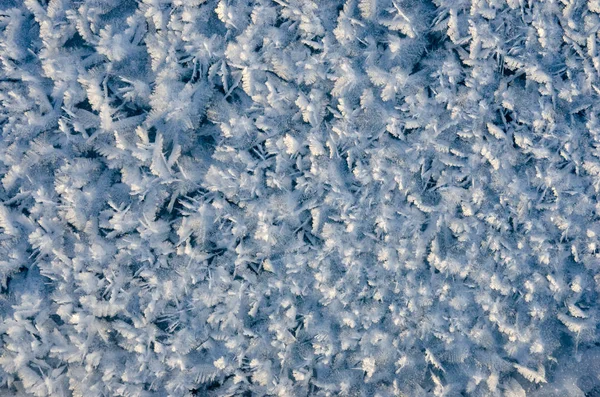 Υφή του πάγου σε μπλε φόντο — Φωτογραφία Αρχείου