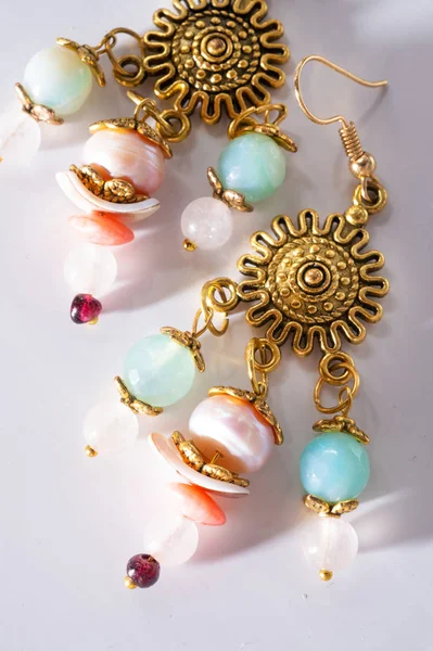 Jewerly bijouterie  earning with semiprecious at white backgro — ストック写真