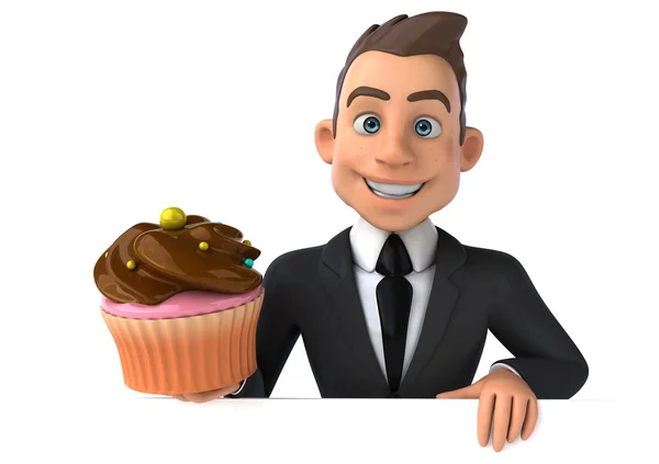 Homme d'affaires tenant cupcake — Photo