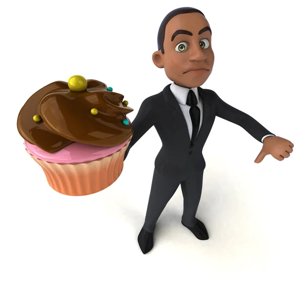 Hombre de negocios sosteniendo cupcake — Foto de Stock