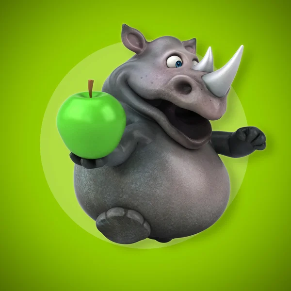 Носорог держит яблоко — стоковое фото
