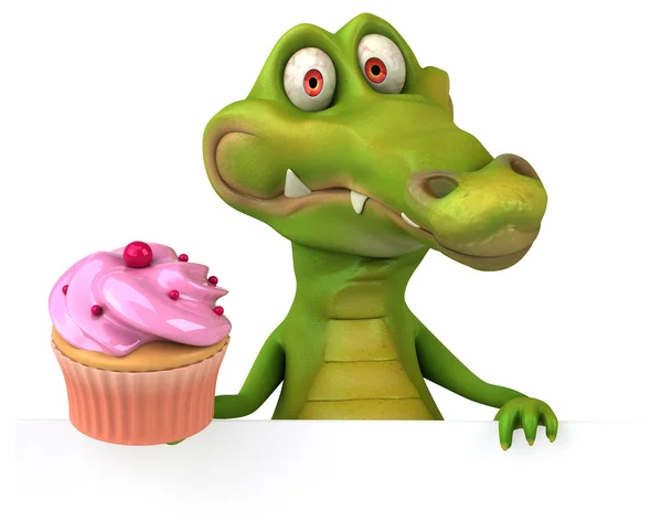 Kul krokodil innehav cupcake — Stockfoto
