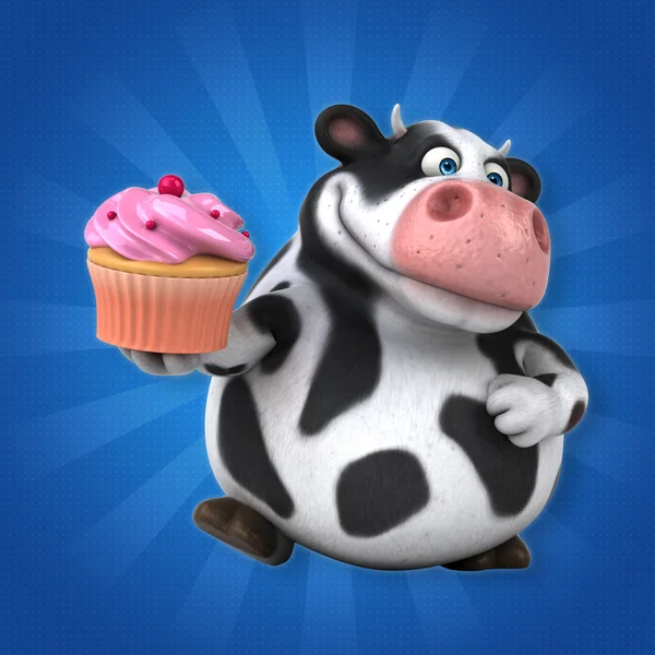 Cow holding cupcake — Stock Photo, Image