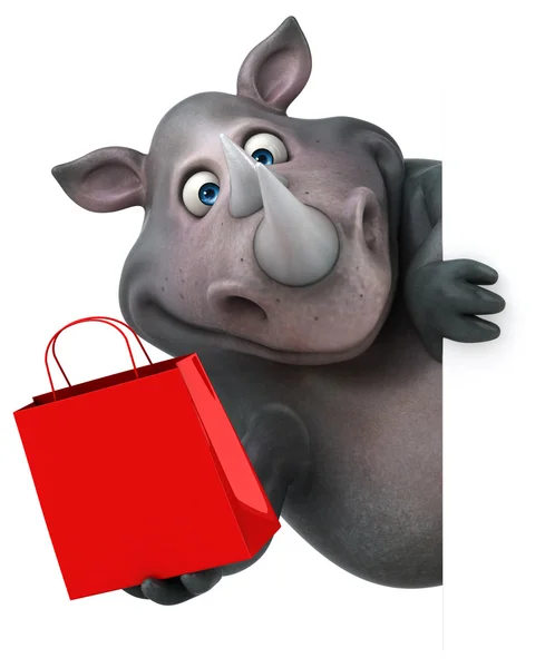 Rinoceronte divertido segurando saco de compras — Fotografia de Stock