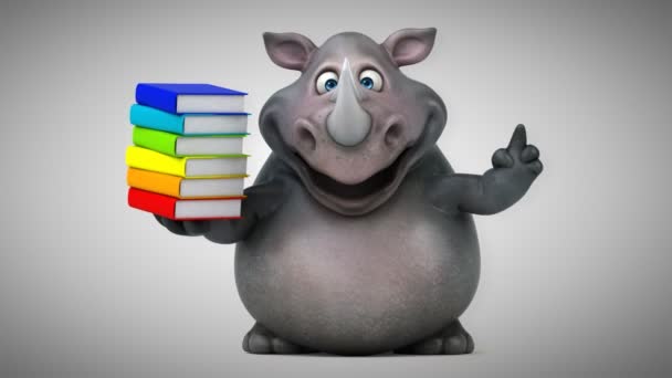 Spaßiges Nashorn mit Büchern — Stockvideo