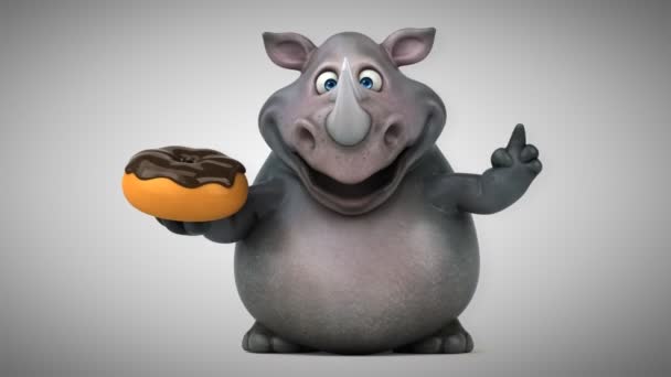 Носорог держит пончик — стоковое видео