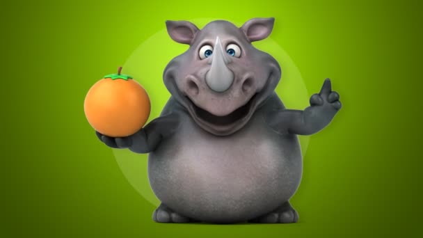 Divertido rinoceronte sosteniendo naranja — Vídeos de Stock