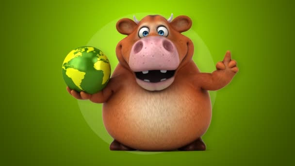 Grappige koe bedrijf globe — Stockvideo