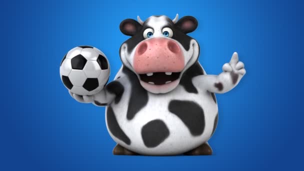 Lustige Kuh hält Ball — Stockvideo