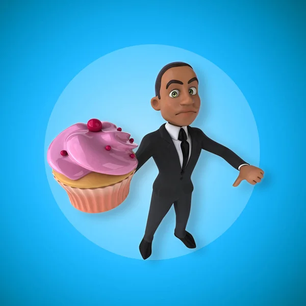 Hombre de negocios sosteniendo cupcake — Foto de Stock