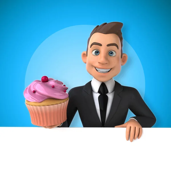 Hombre de negocios sosteniendo cupcake — Foto de Stock
