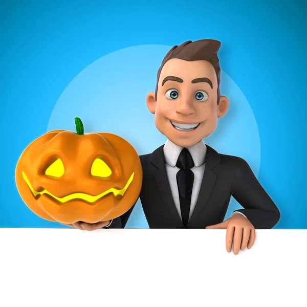 Businessman holding pumpking — Stock Photo, Image