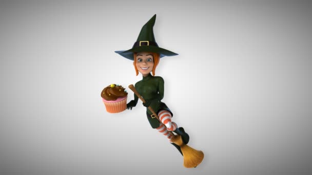 Sexy bruxa segurando cupcake — Vídeo de Stock