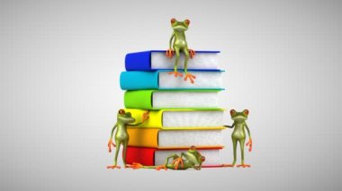 Kitapların yanında üç boyutlu yeşil kurbağa.