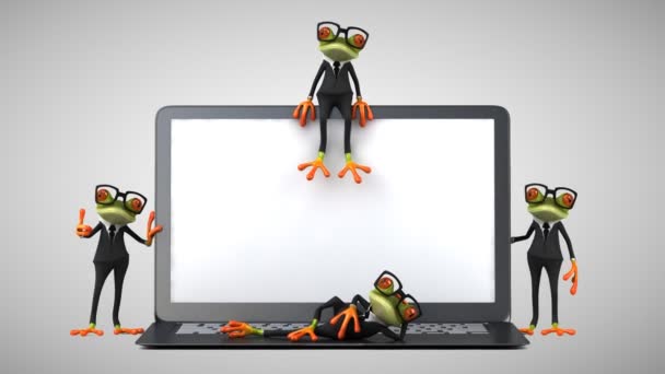 ノートパソコンの横にある緑のカエルの3D — ストック動画